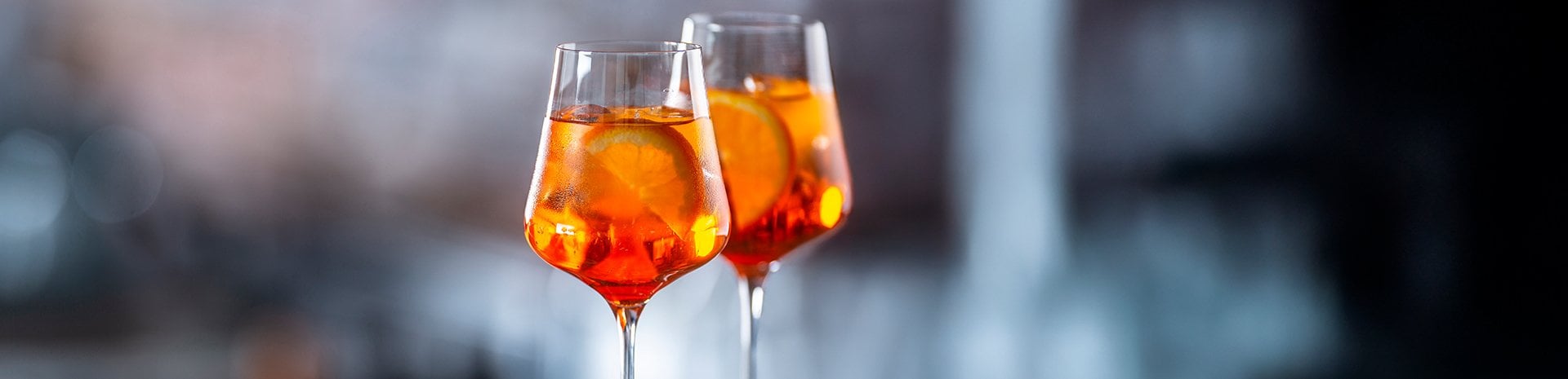 Two aperitif glasses with orange on an MSC cruise | MSC Cruises Two aperitif glasses with orange on an MSC cruise | MSC Cruises