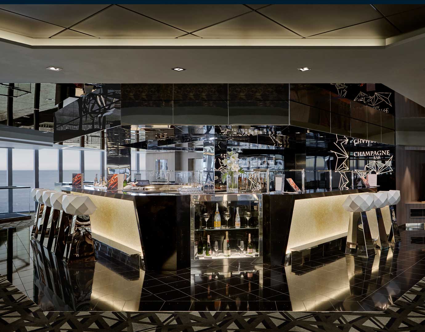 Luxurious champagne bar with ocean view on an MSC cruise ship | MSC Cruises Luxurious champagne bar with ocean view on an MSC cruise ship | MSC Cruises